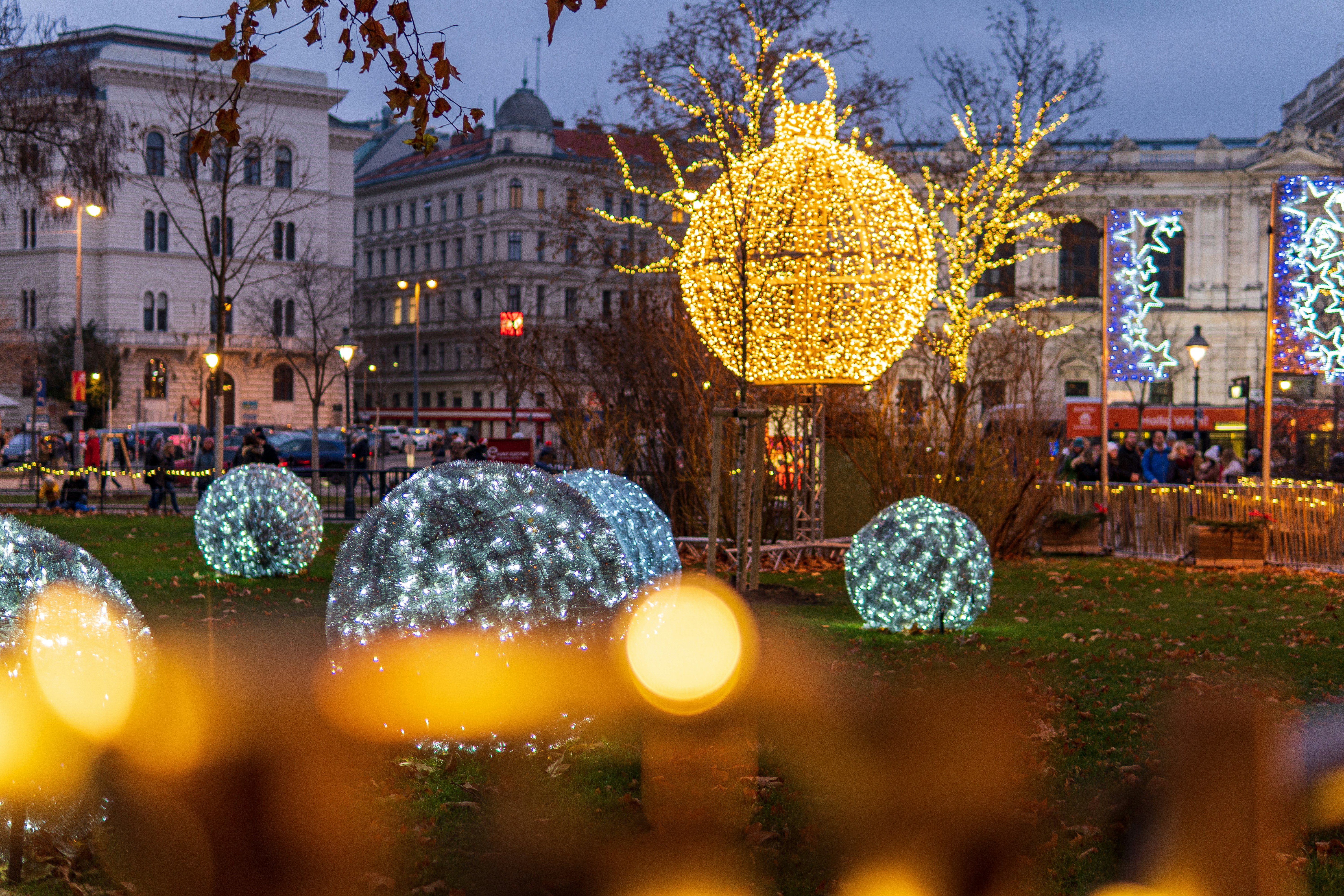 green and yellow christmas tree with string lights