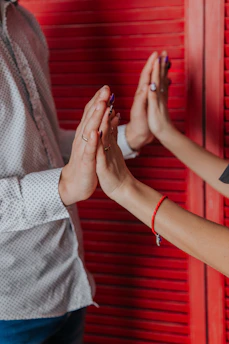 woman in white and black polka dot dress