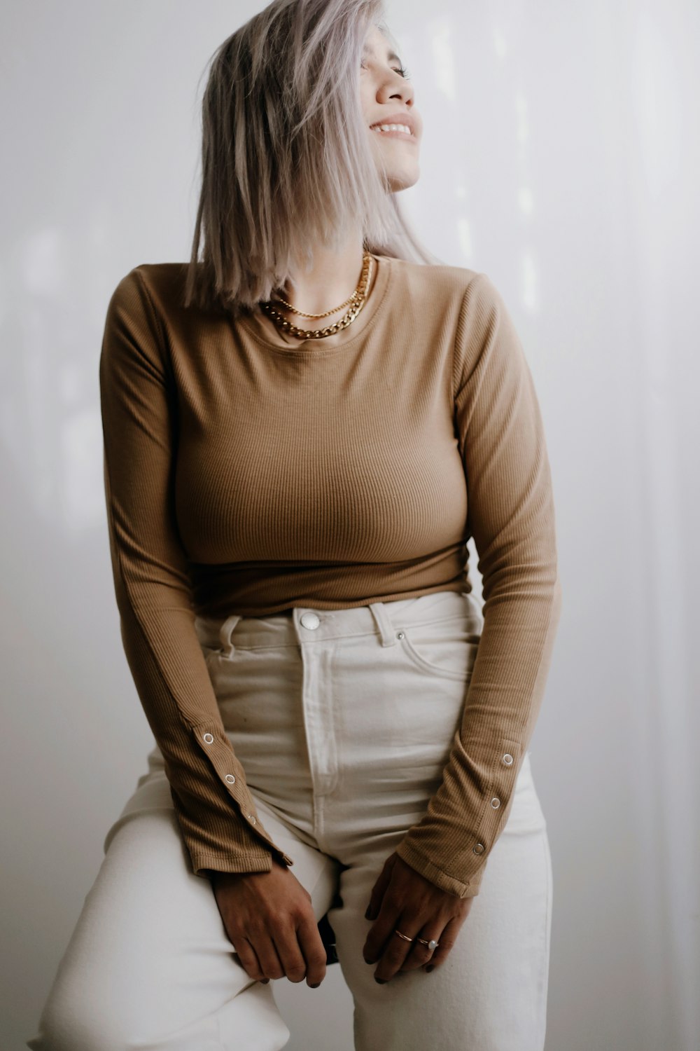 woman in brown long sleeve shirt