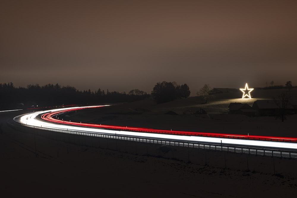 time lapse photography of cars on road during night time