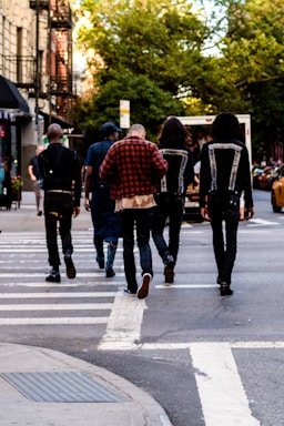 people walking on pedestrian lane during daytime