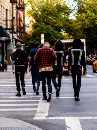 people walking on pedestrian lane during daytime