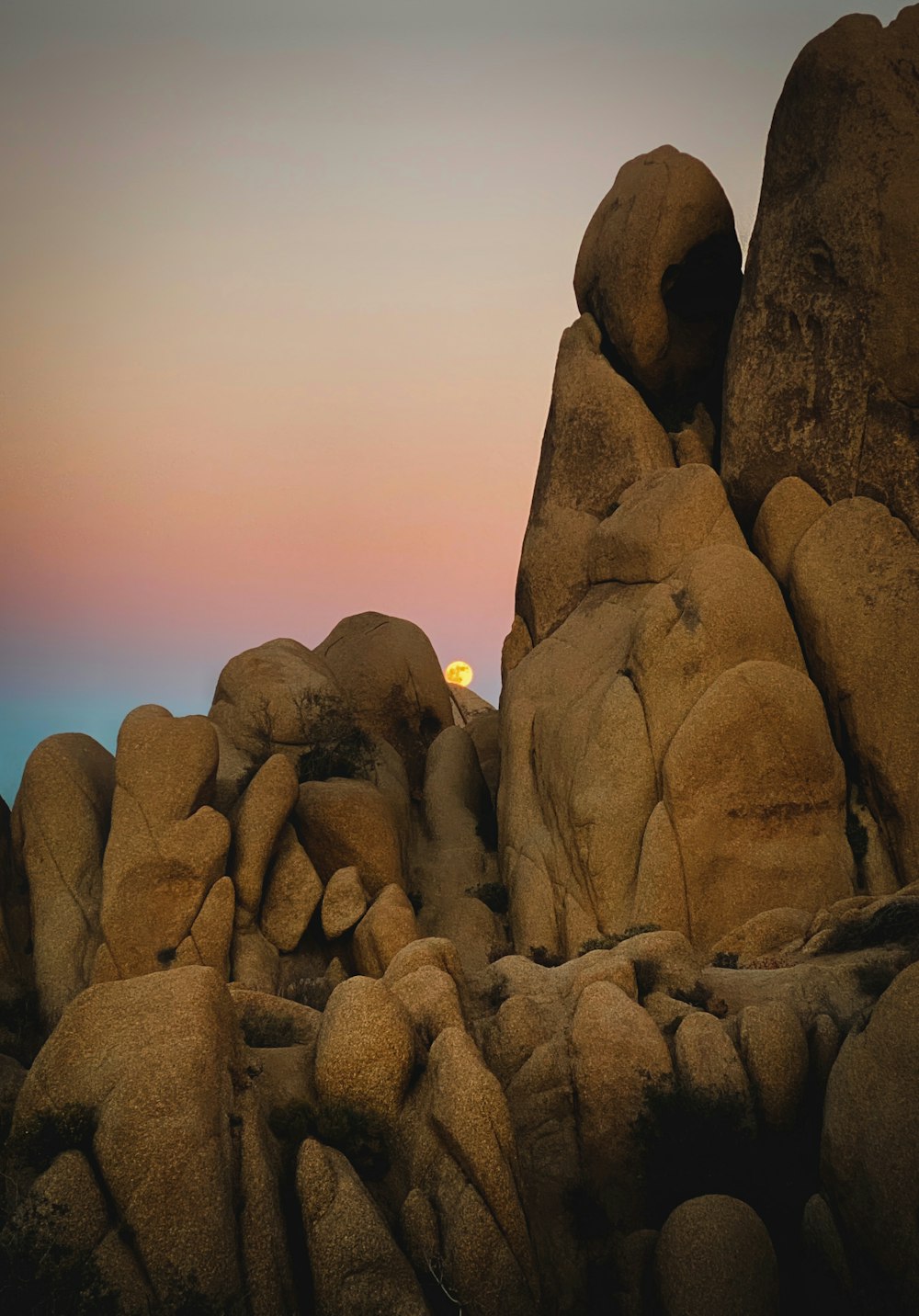 brown rock formation under blue sky during daytime