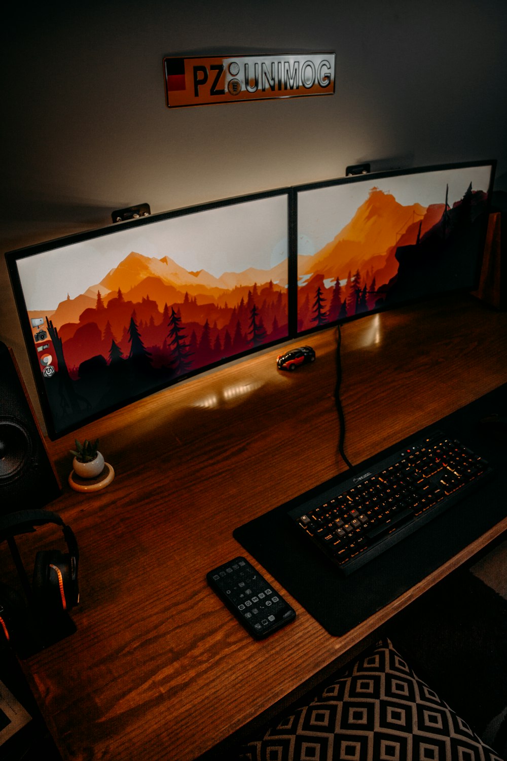 black computer keyboard on brown wooden desk