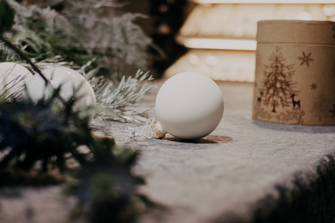 white egg on gray textile