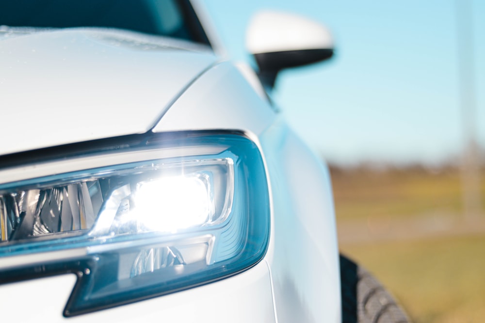 white car with blue light