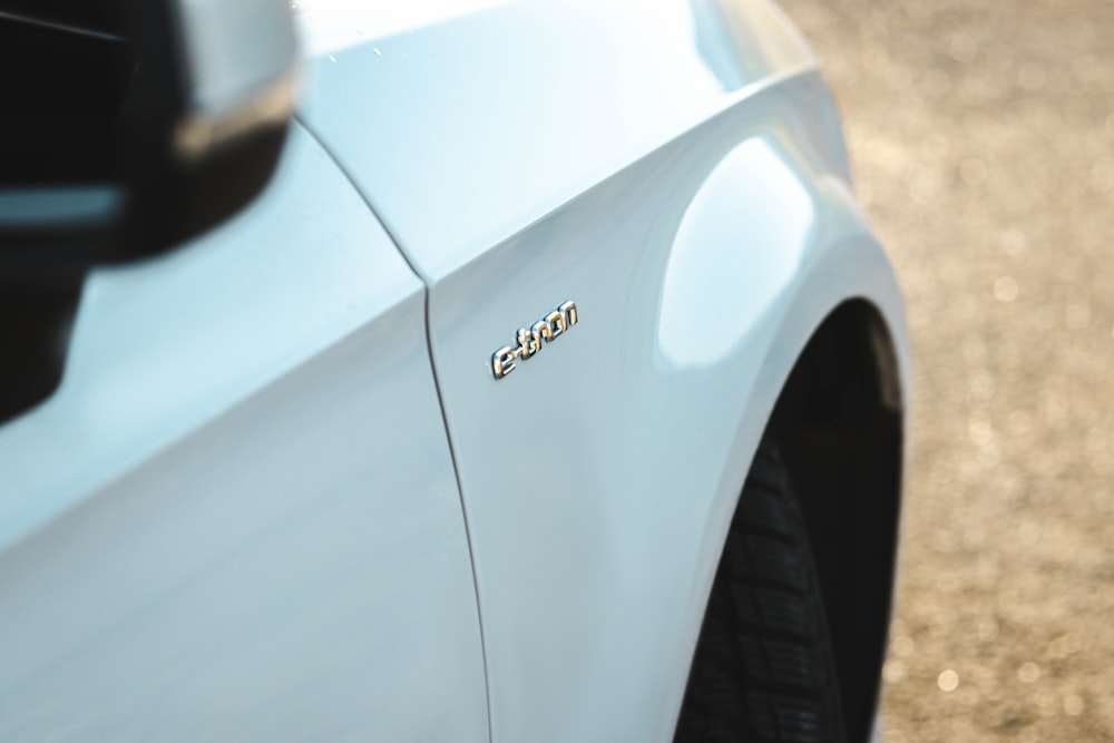 white car on brown soil