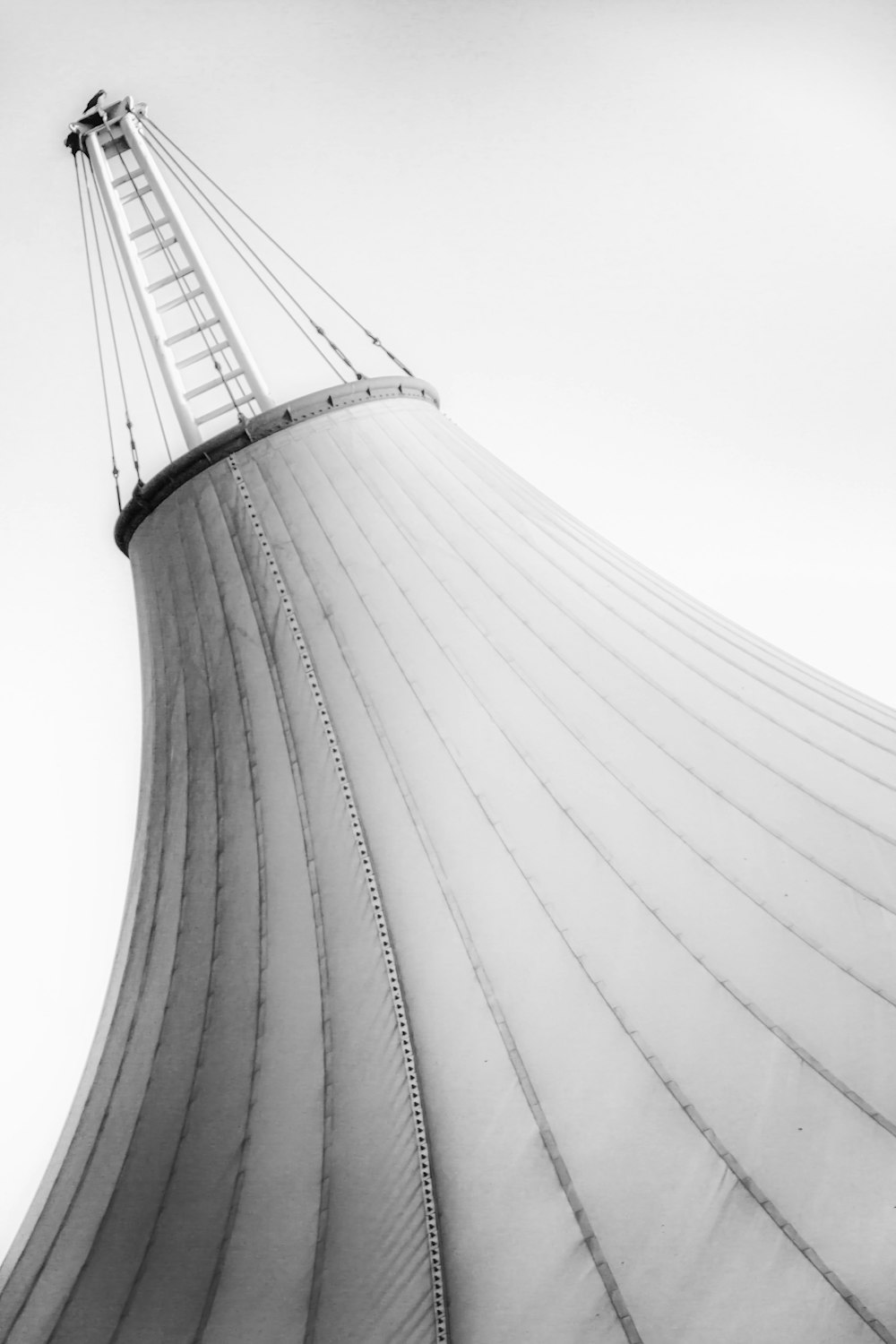 white and black tower under white sky