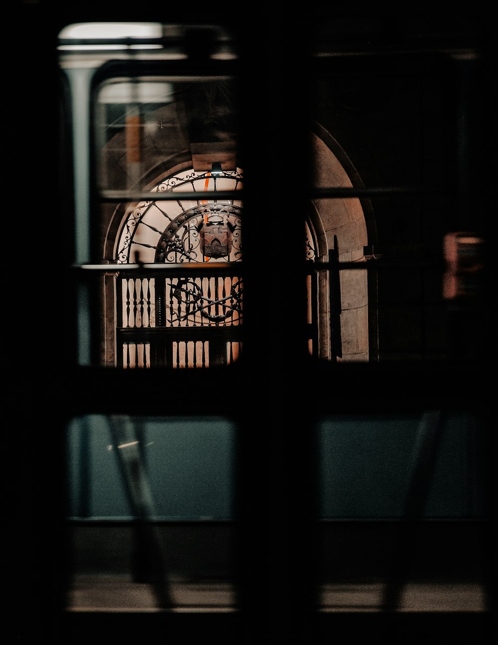 black metal framed glass window