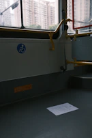 A wheelchair securely fastened inside a spacious, well-lit transport vehicle.