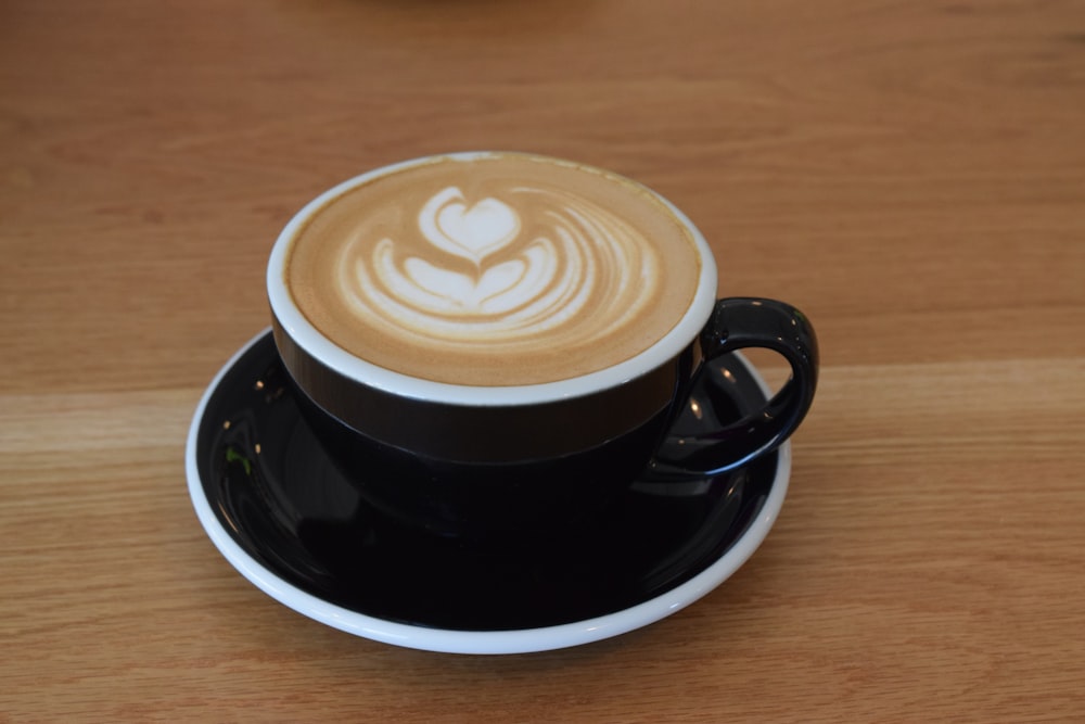 black ceramic mug with coffee