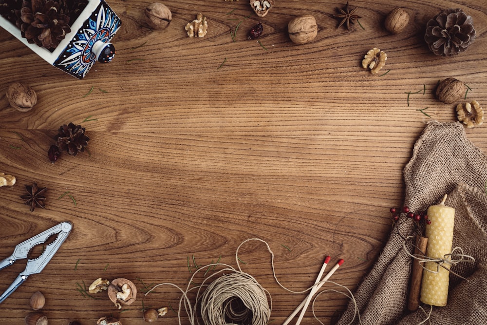 white and blue lollipop on brown wooden table