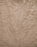 brown textile on brown wooden table