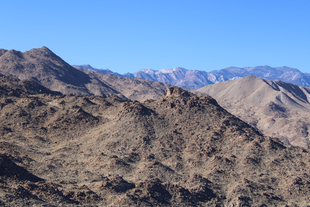 brown and green mountain under blue sky during daytime