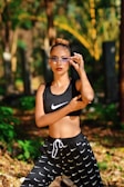 woman in black tank top and black and white skirt