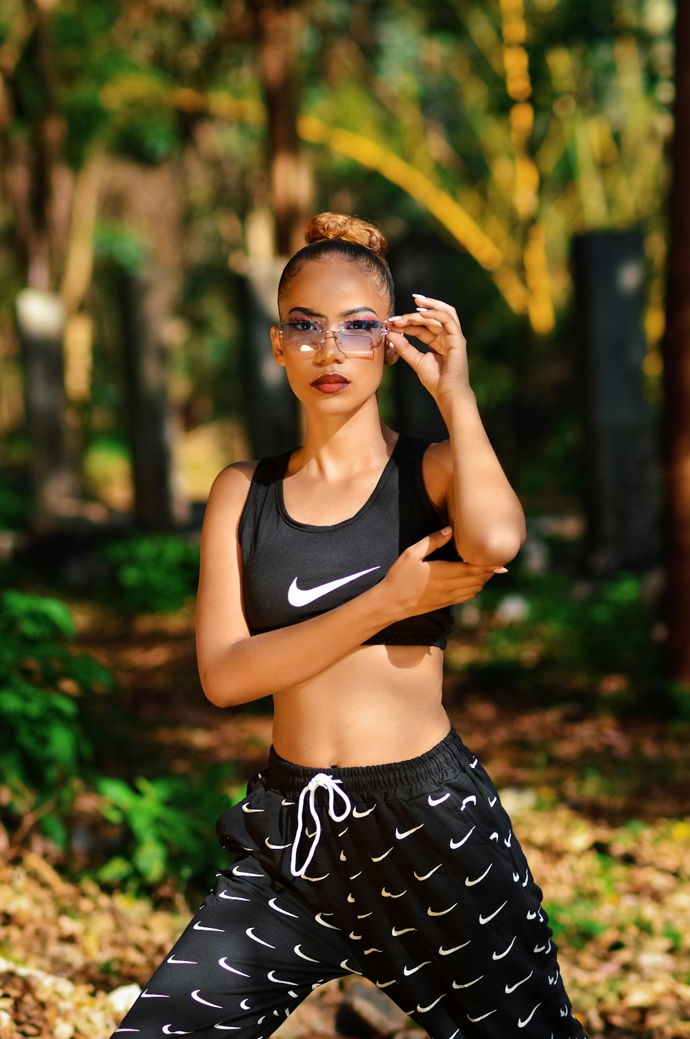 woman in black tank top and black and white skirt