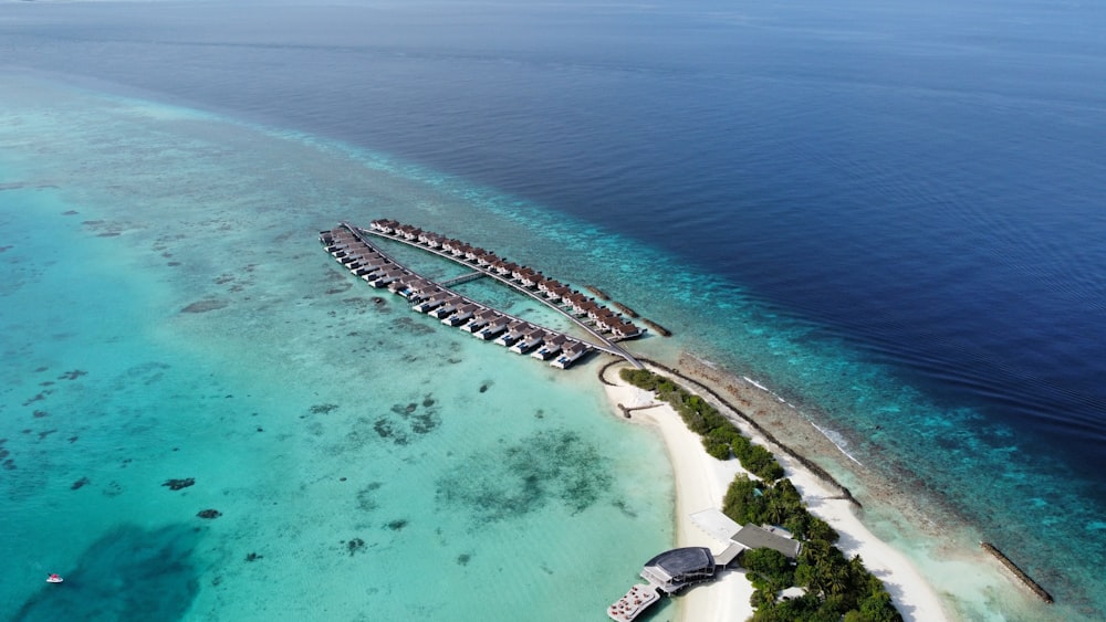 aerial view of white sand beach during daytime