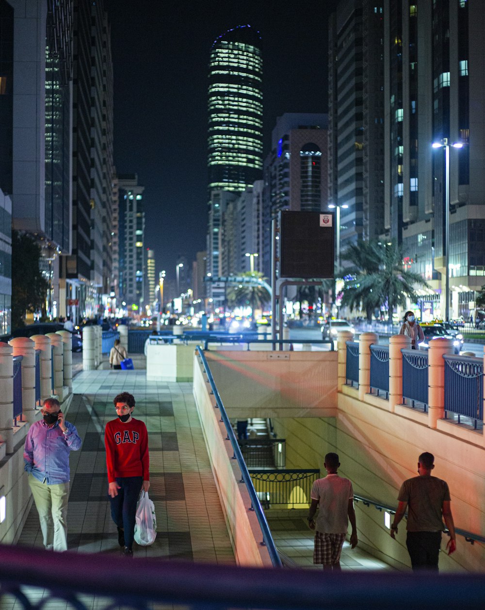 people walking on sidewalk during daytime