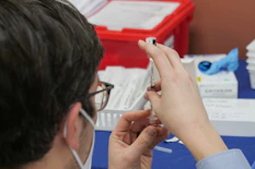 Pharmacist preparing medication at Fillcera Pharmacy