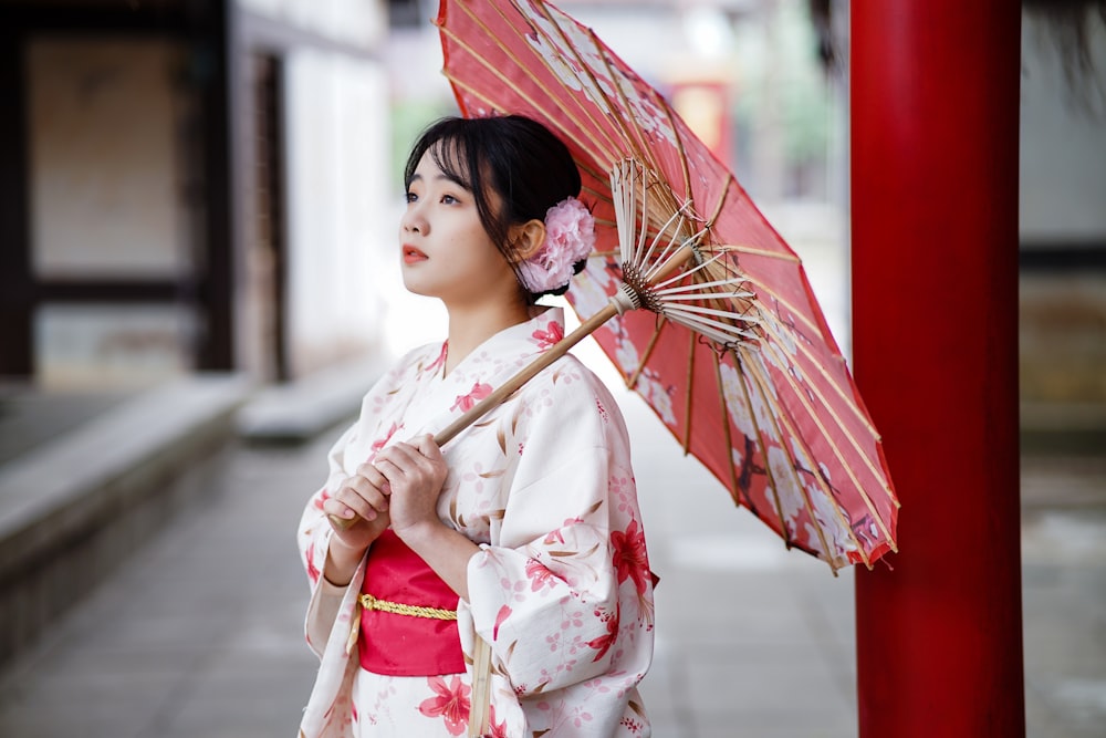 girl in kimono holding umbrella