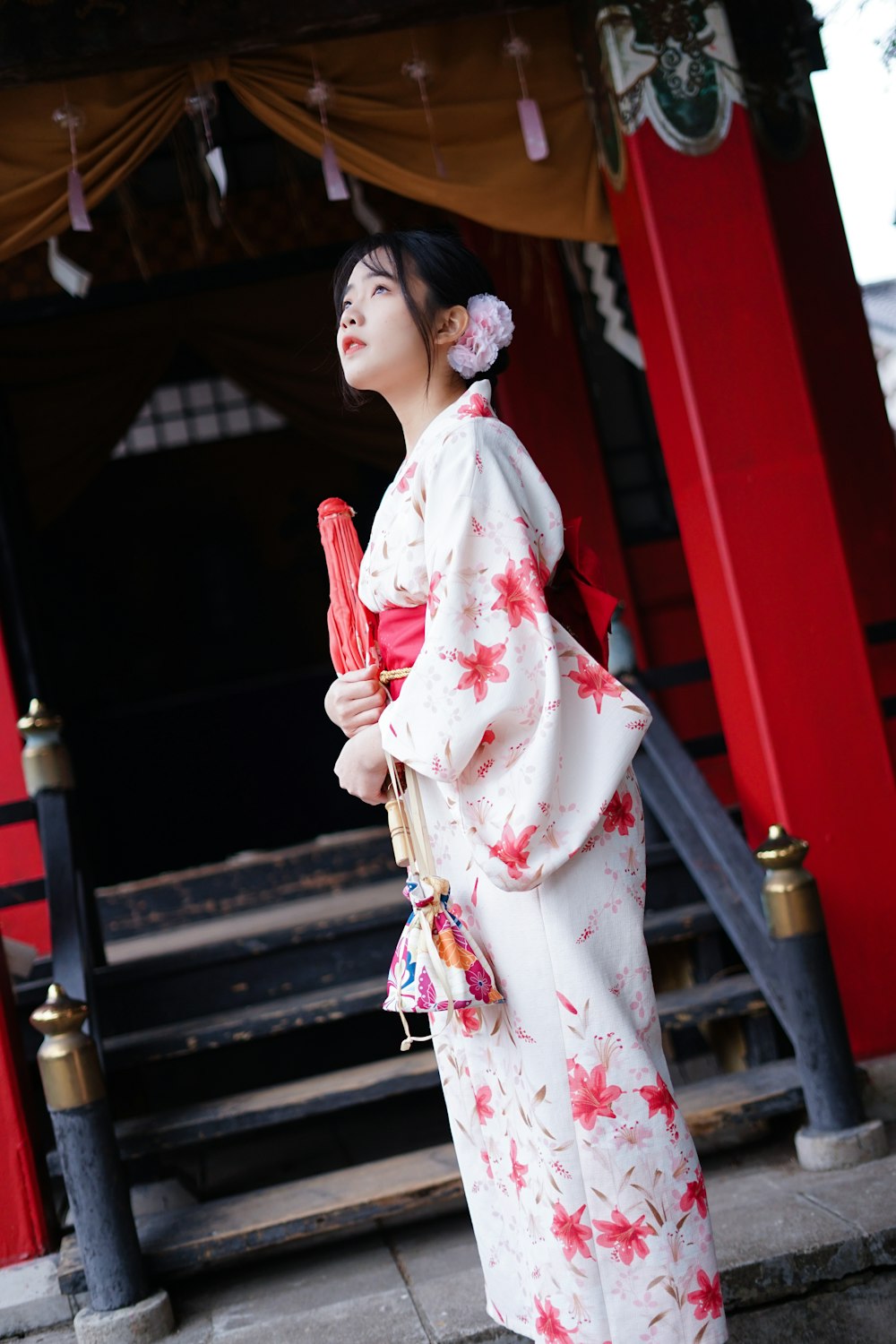 woman in white and red floral kimono