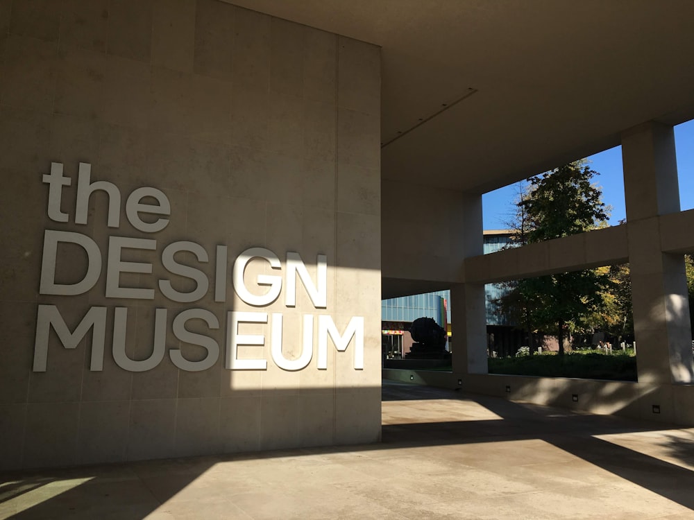 the design museum sign in front of a building