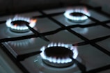 black gas stove with white and black gas stove