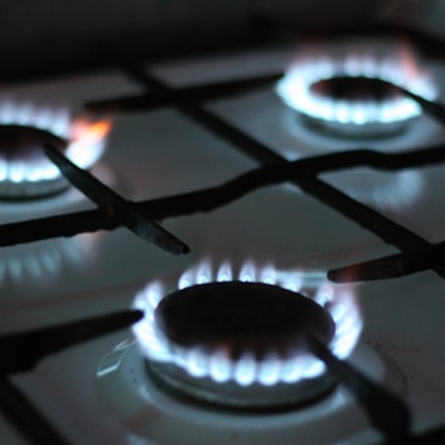 black gas stove with white and black gas stove