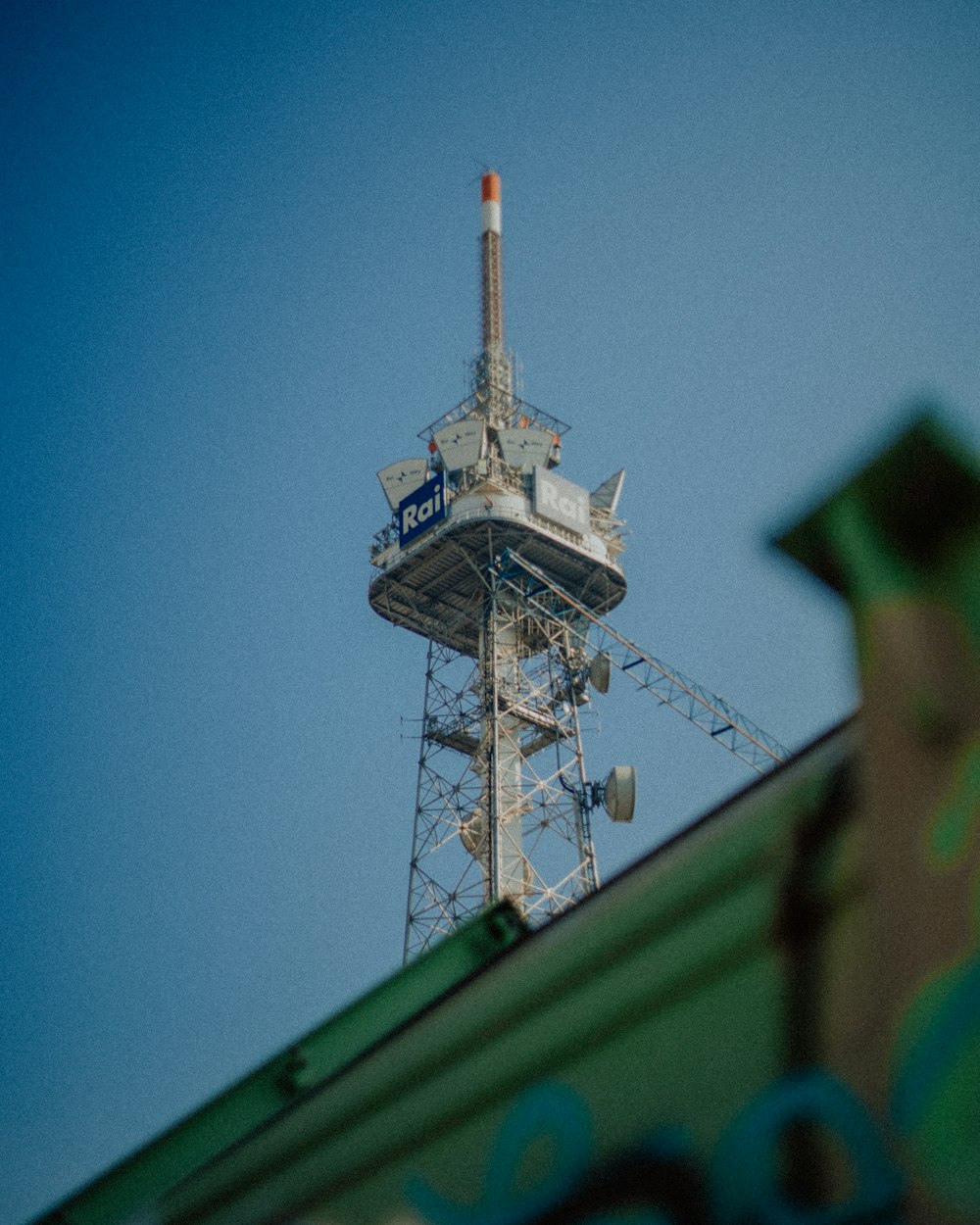 white and green tower under blue sky during daytime