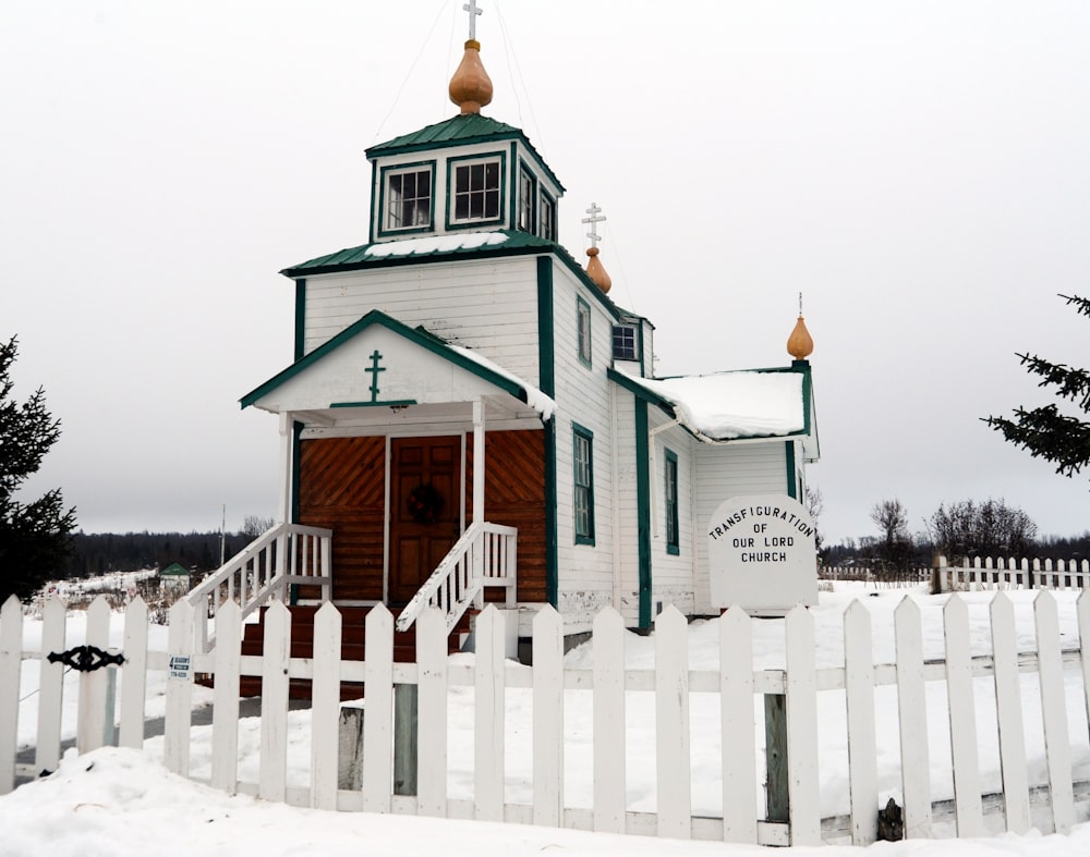 white and brown wooden church