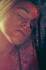 A serene image of a person meditating with soft glowing light around them.