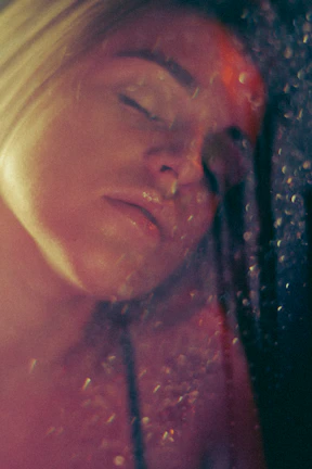 Close-up of a relaxing facial treatment with gentle golden light