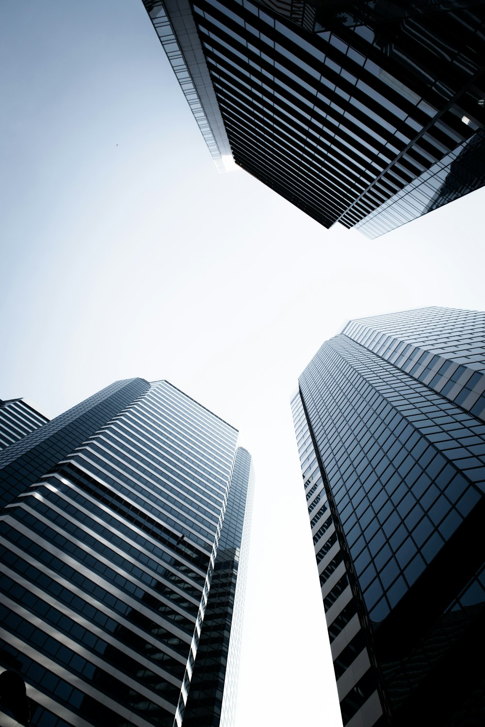 low angle photography of high rise buildings