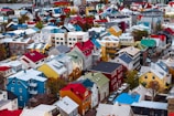 An aerial view of a vibrant neighborhood with various homes.