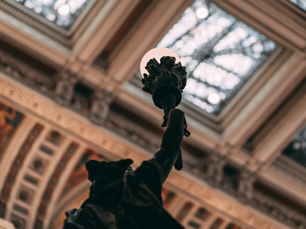 black concrete statue of man