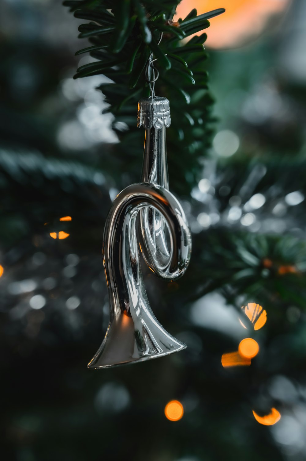 gold and silver round pendant