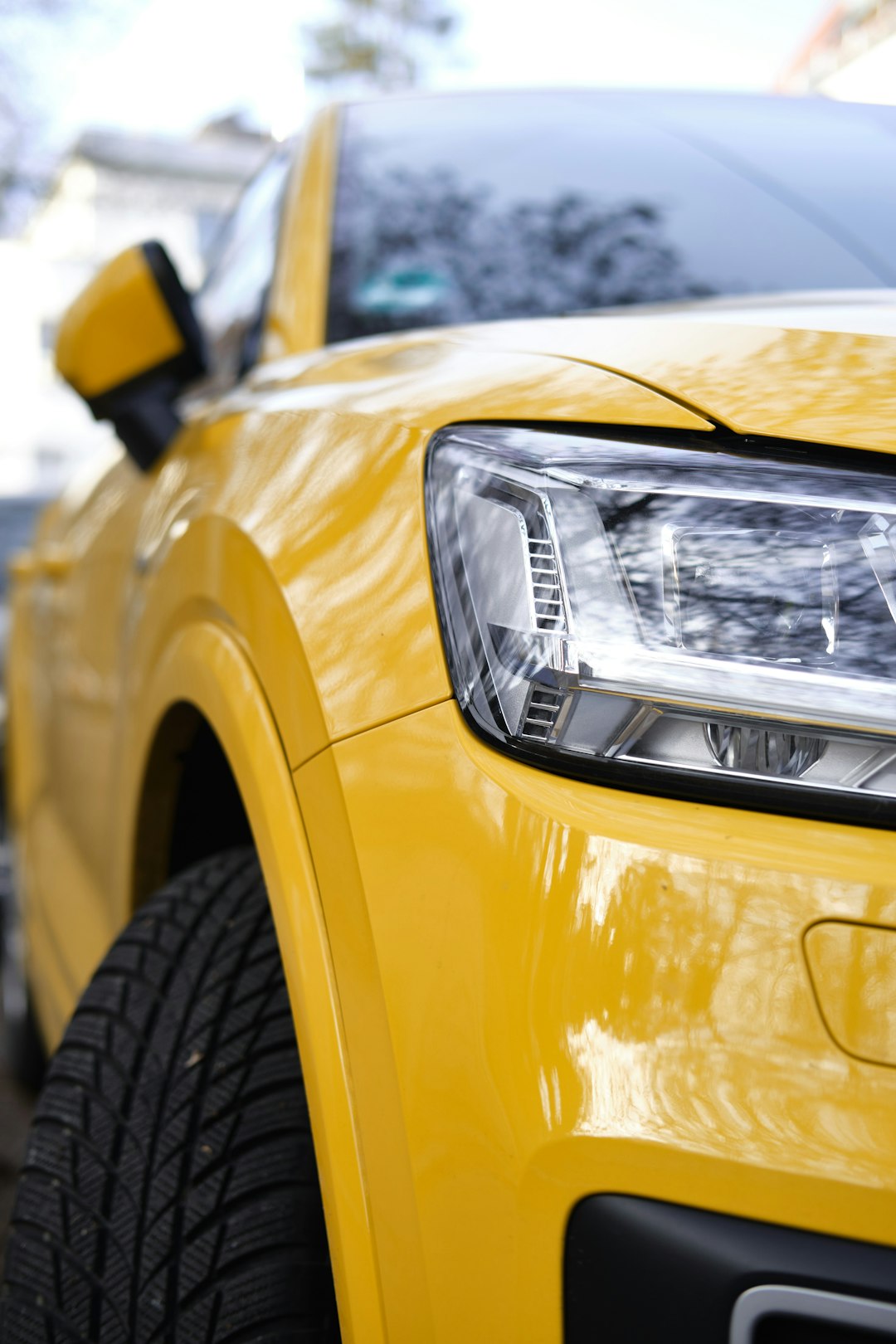 yellow car with broken window