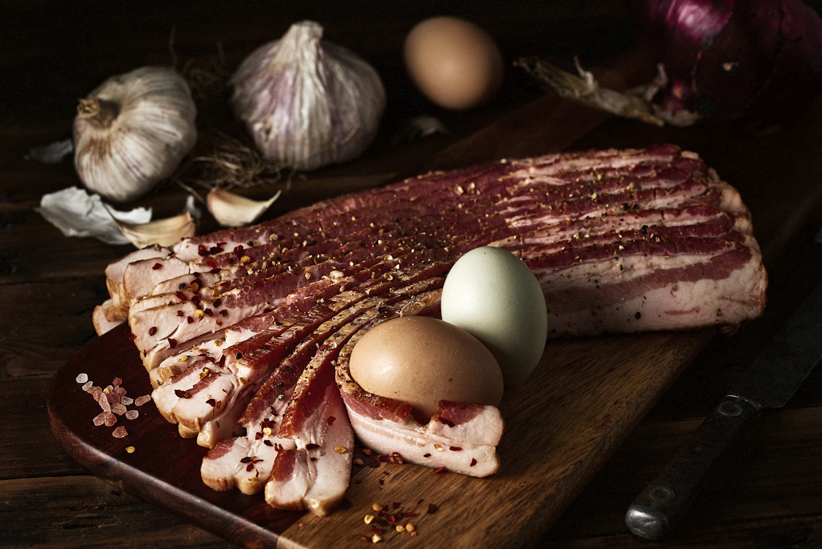Fresh breakfast ingredients on a wooden board