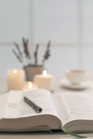 One-on-one coaching conversation in a calm, welcoming space with open books.