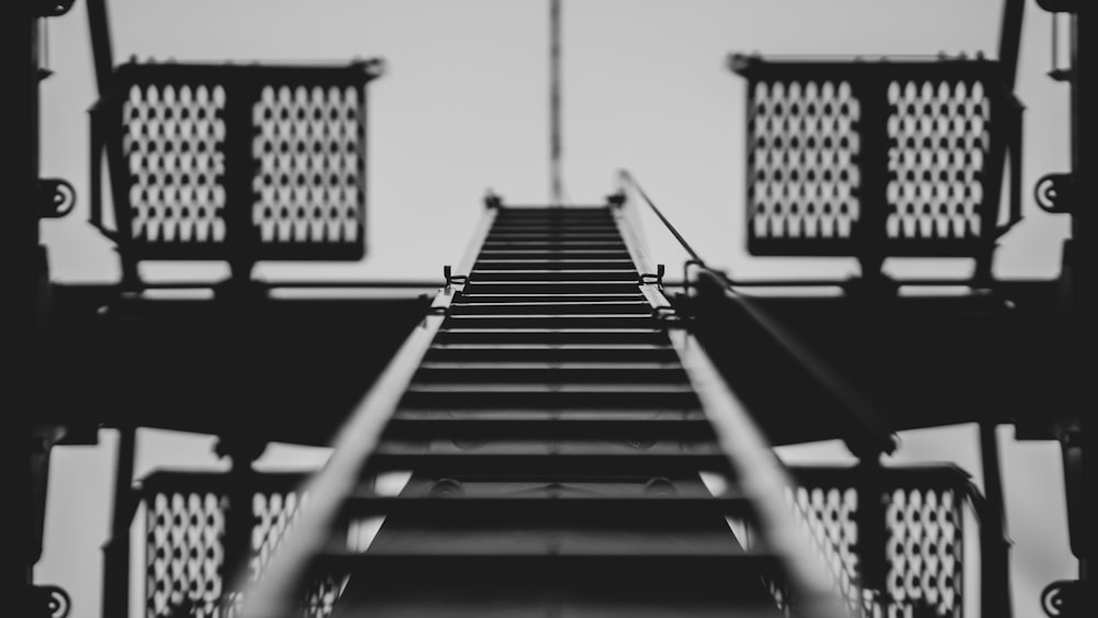 grayscale photo of a bridge