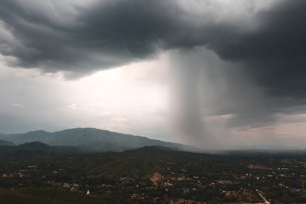 green mountains under white clouds during daytime