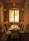 A stylish dining chair set in an elegant dining room.