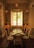 A stylish dining chair set in an elegant dining room.