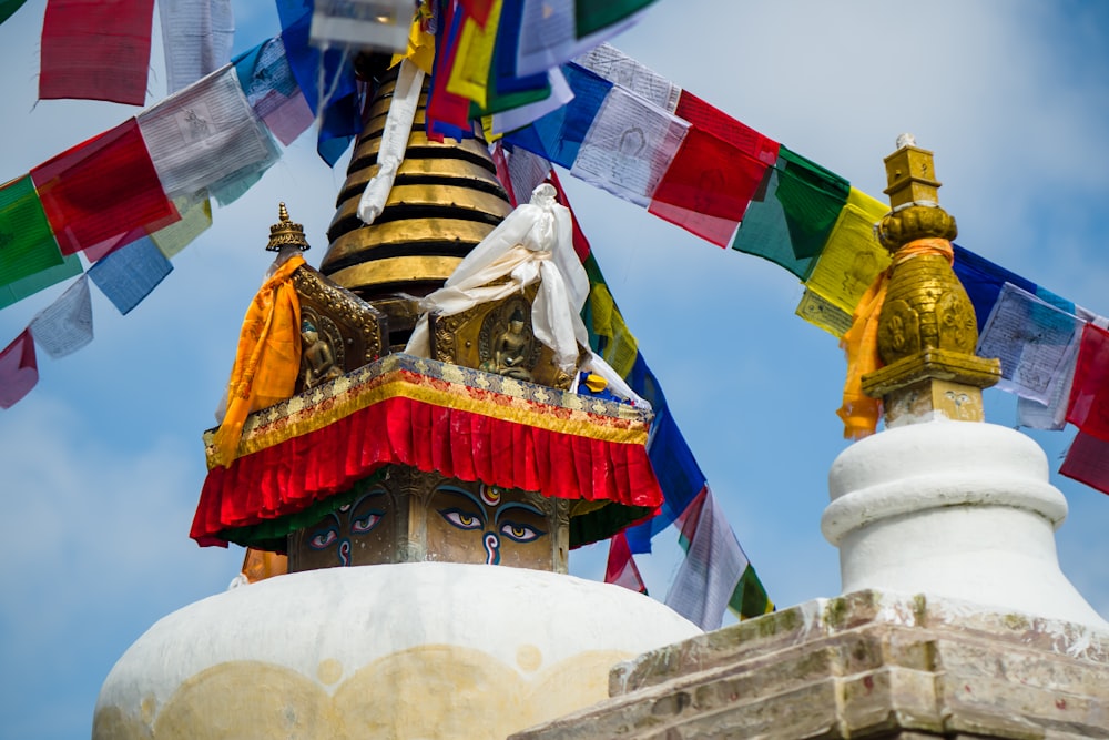 low angle photography of gold and red temple