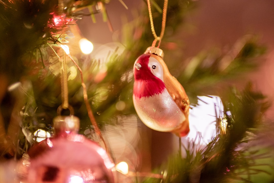 red and white bird figurine