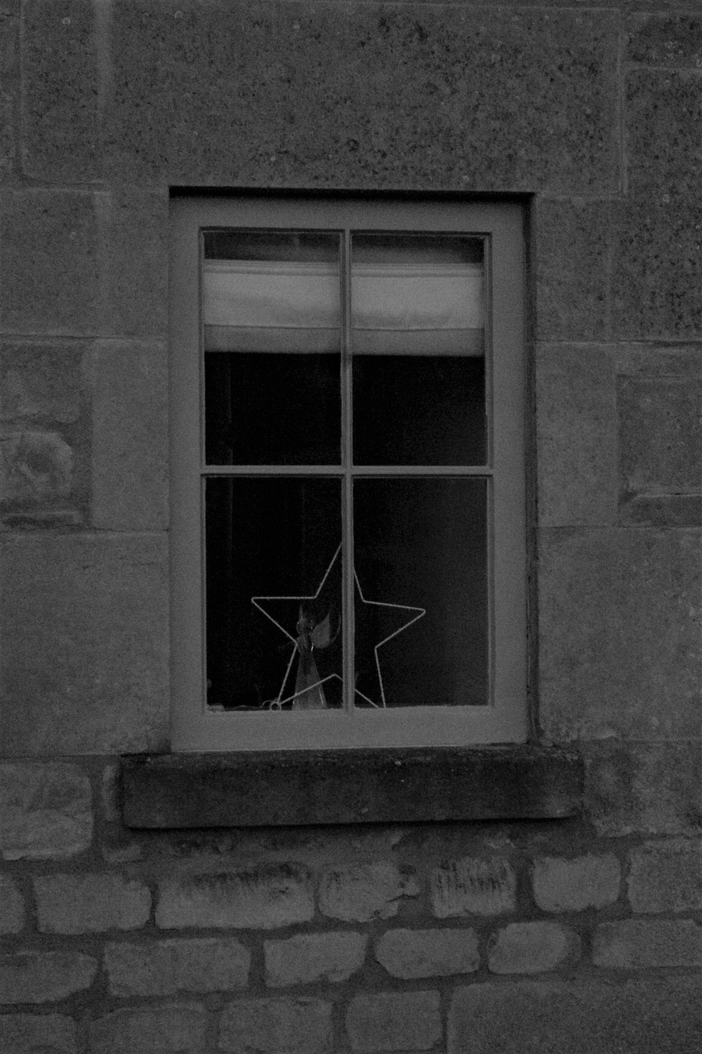 white wooden framed glass window