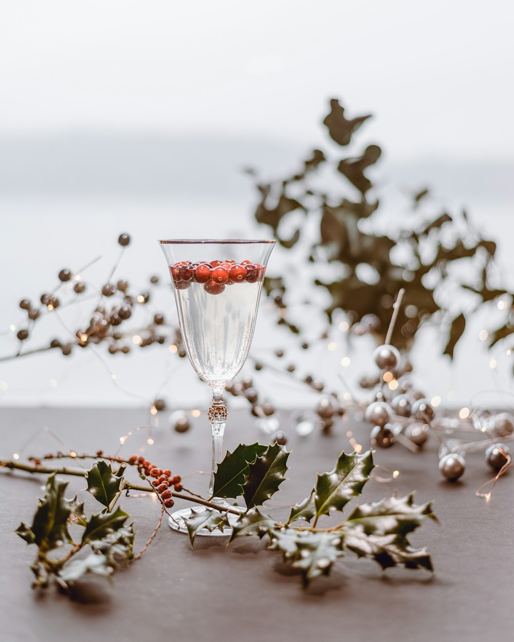 red rose on clear glass vase