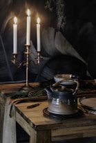 blue ceramic teapot on brown wooden table