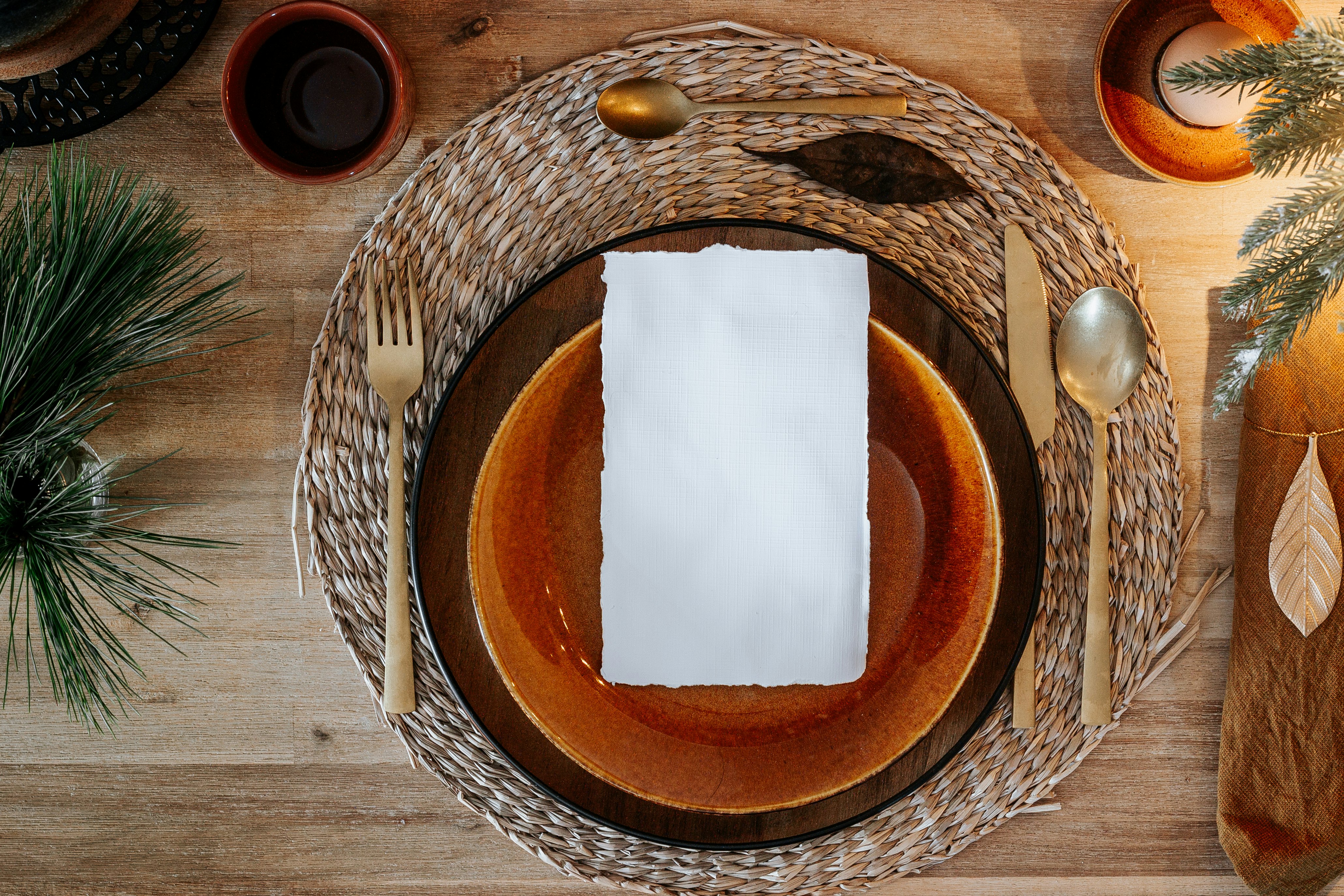 brown and white paper on brown woven round basket