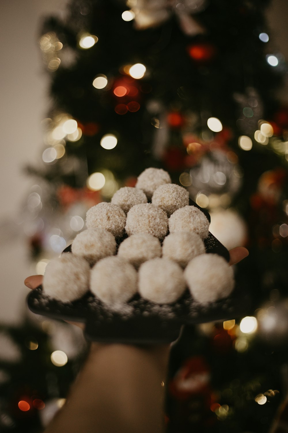 white round ornament on black round container